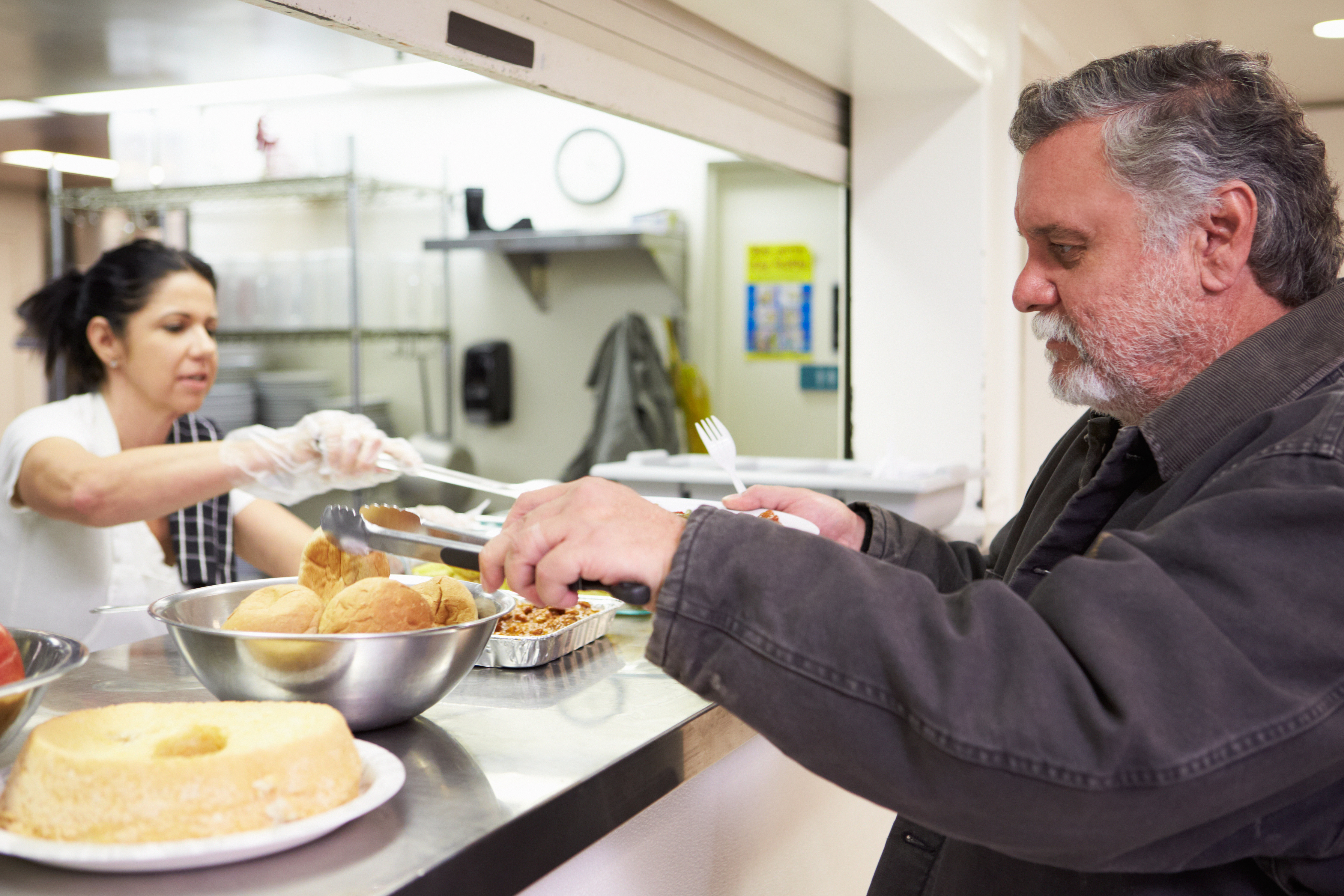 homeless not hopeless serving food